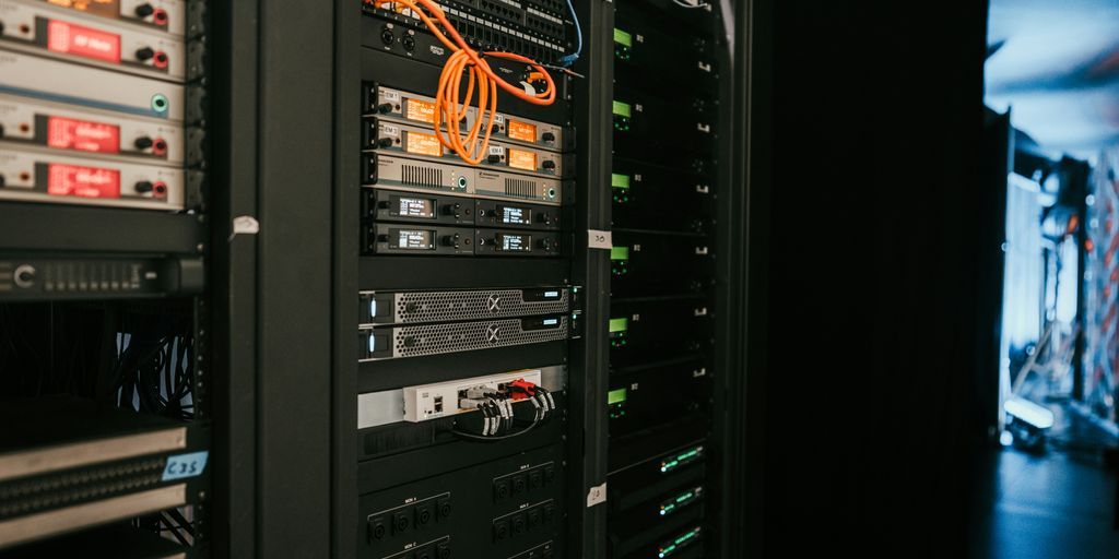 a rack of servers in a server room
