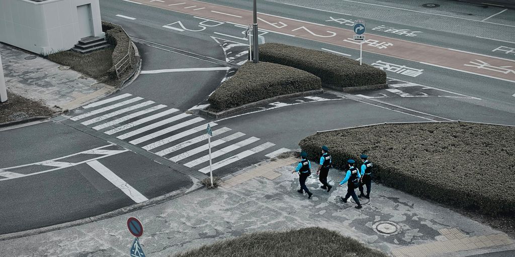 people walking on gray concrete road during daytime