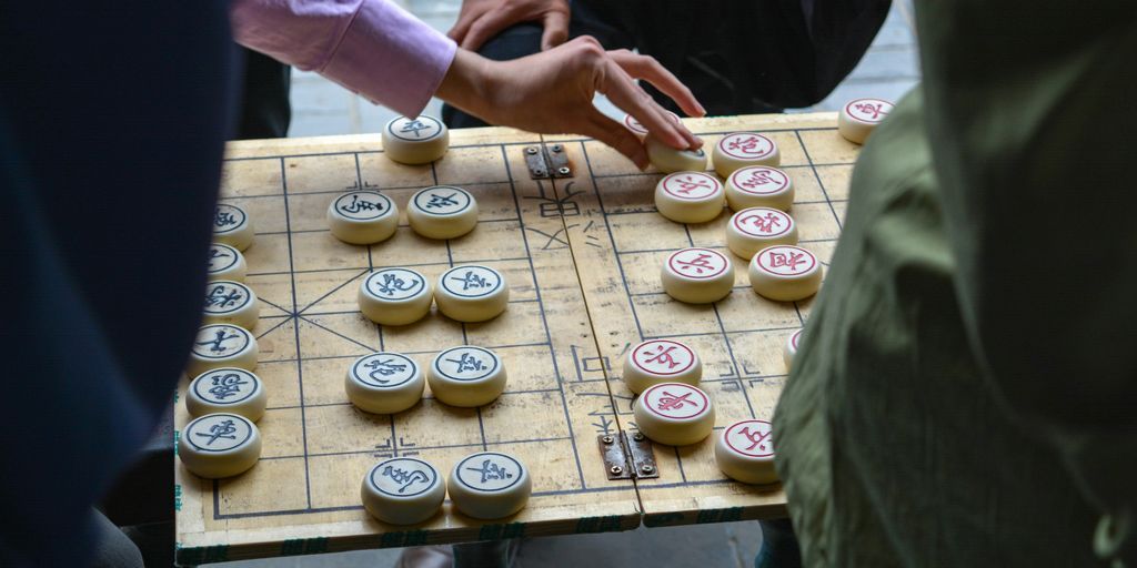 person playing board game