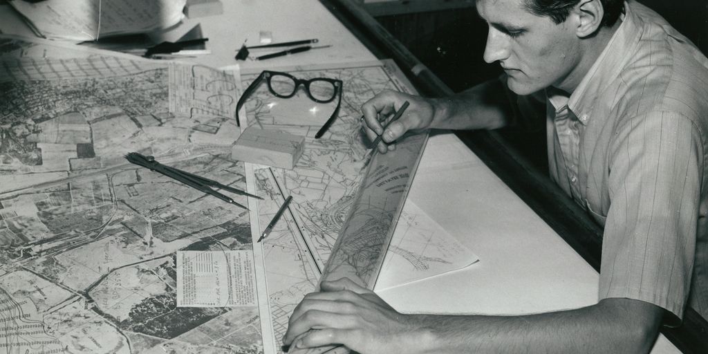 man holding paper