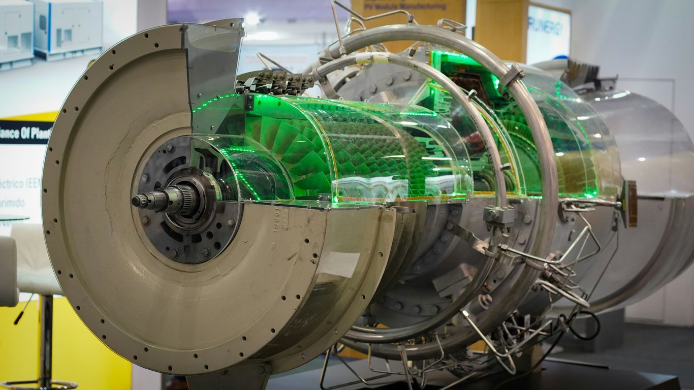 a machine with a green light inside of it