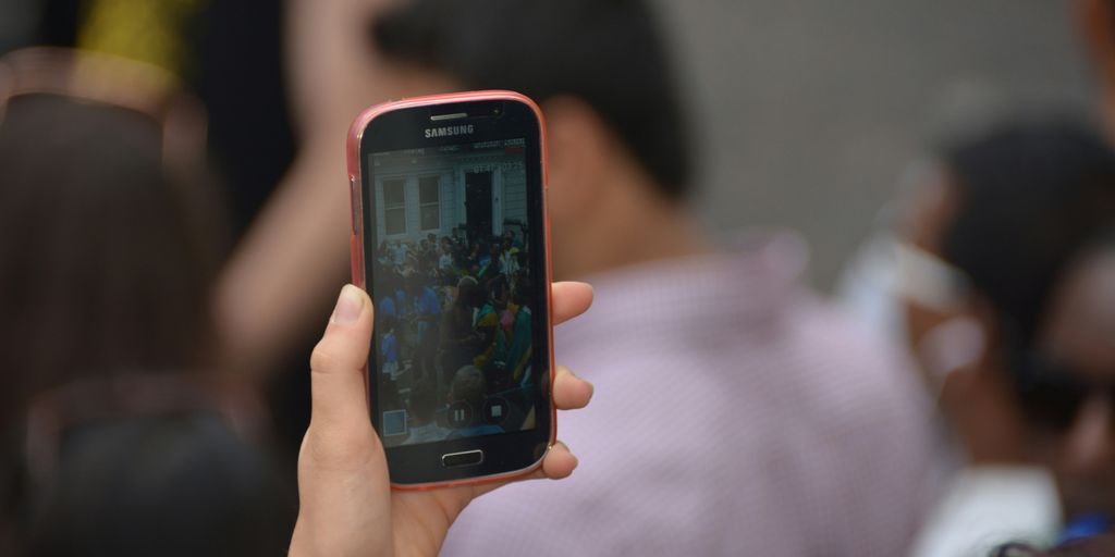 a person holding a cell phone