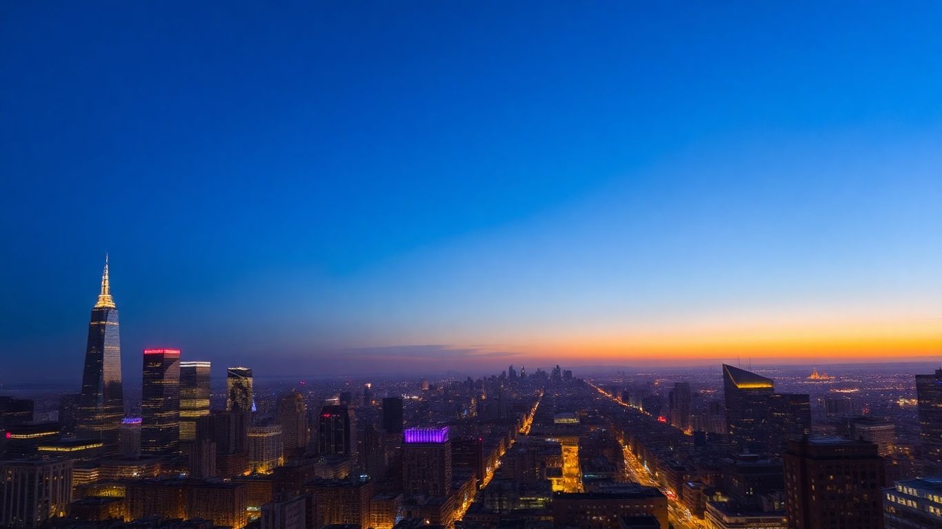 Cityscape at dusk with glowing buildings and streets.