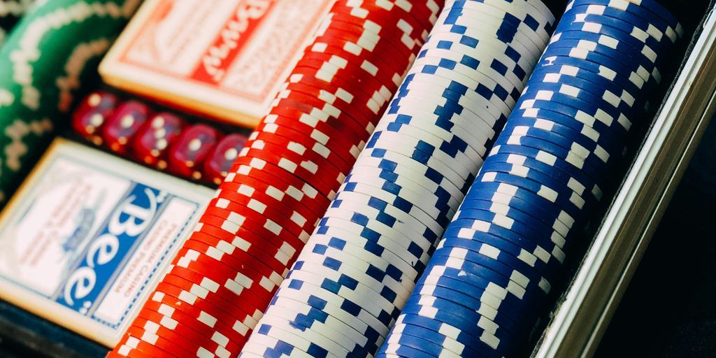 closeup photography of poker chip set