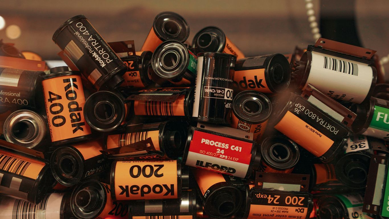 A pile of batteries sitting on top of a table
