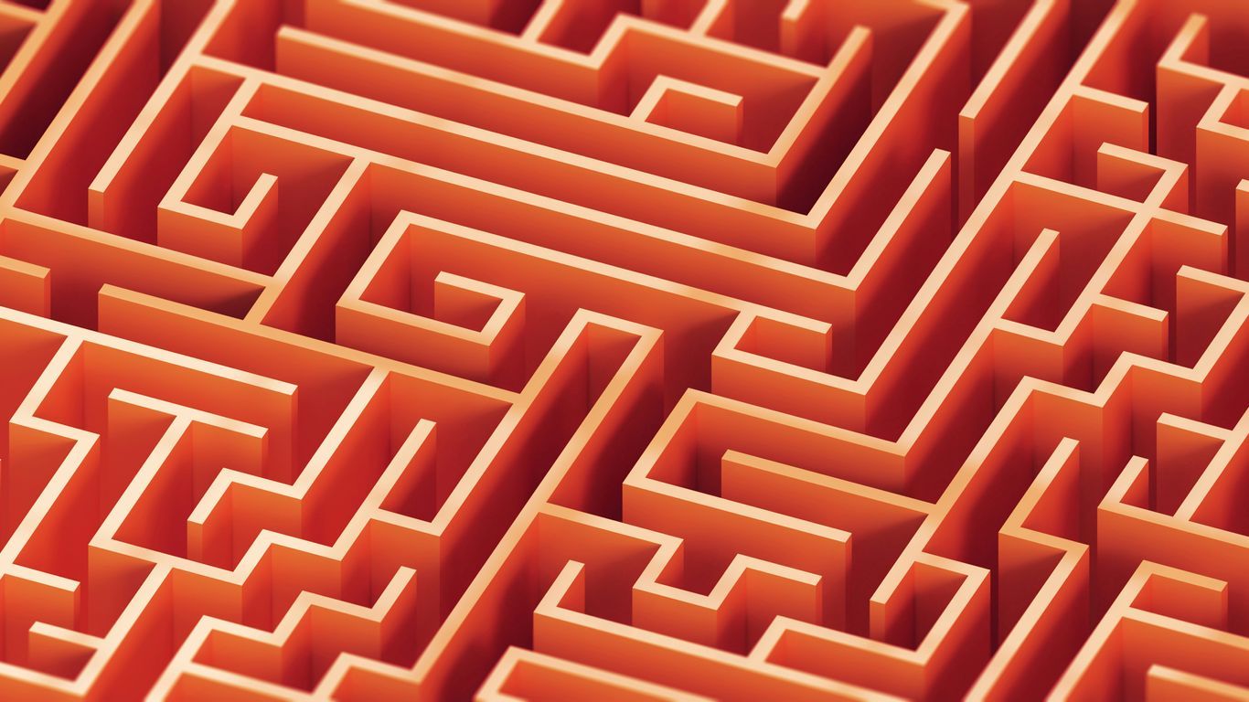 A complex, orange maze is pictured.