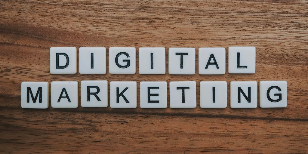 digital marketing artwork on brown wooden surface