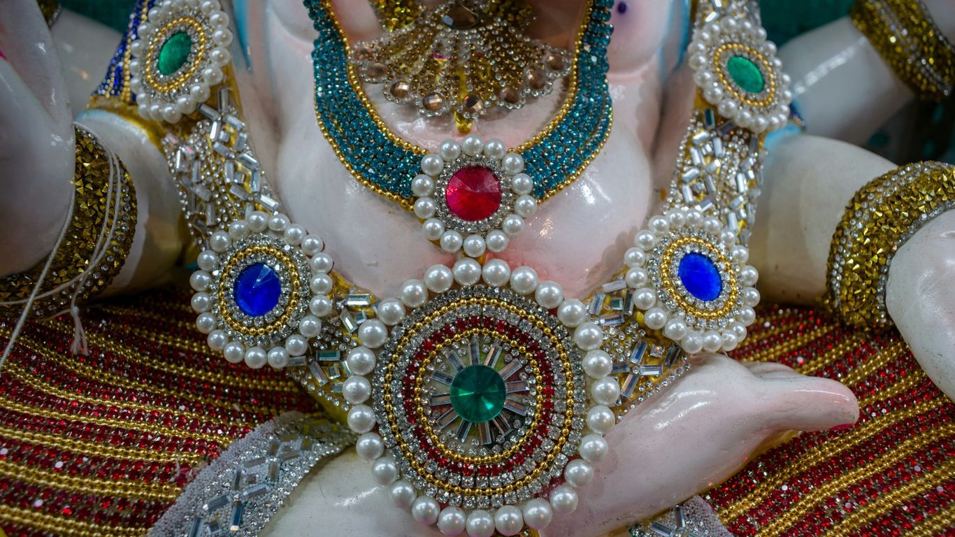 a close-up of a person wearing a necklace