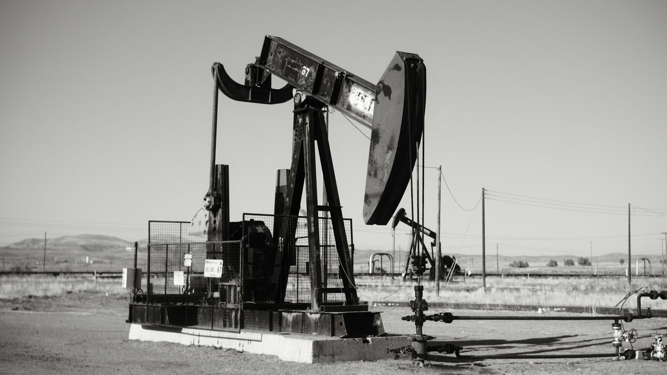 a black and white photo of an oil pump