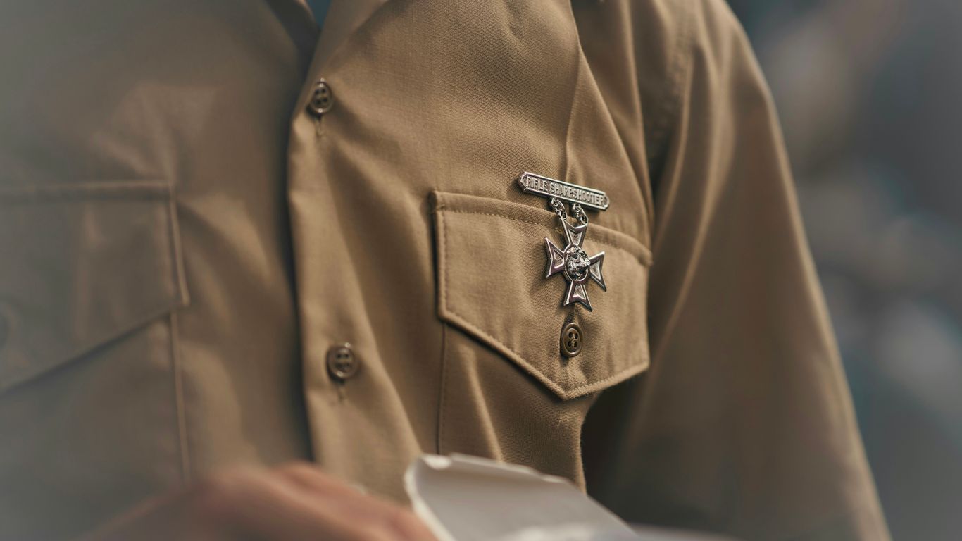Man wearing a medal on his uniform shirt